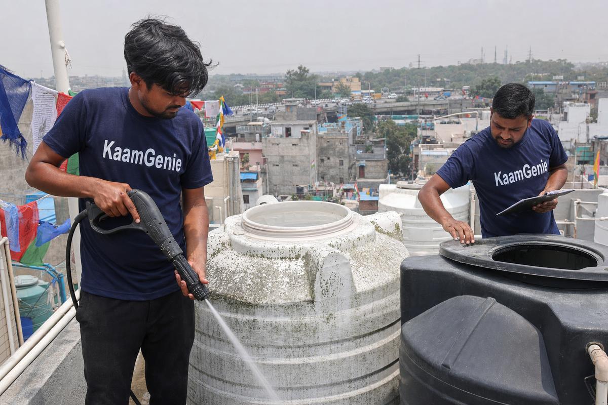 KaamGenie crew cleaning a water tank in Aruna Nagar, North Delhi
