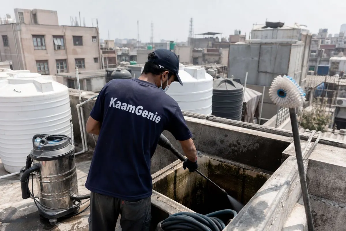 KaamGenie crew cleaning a water tank in Azadpur, North Delhi