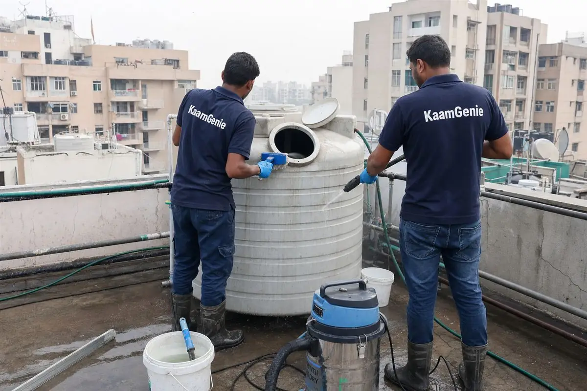 KaamGenie crew cleaning a water tank in Dwarka Sector 16, Delhi