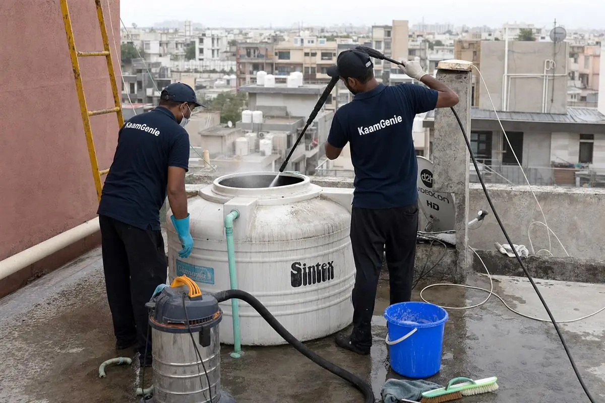 KaamGenie crew cleaning a water tank in Dwarka Sector 26, Delhi