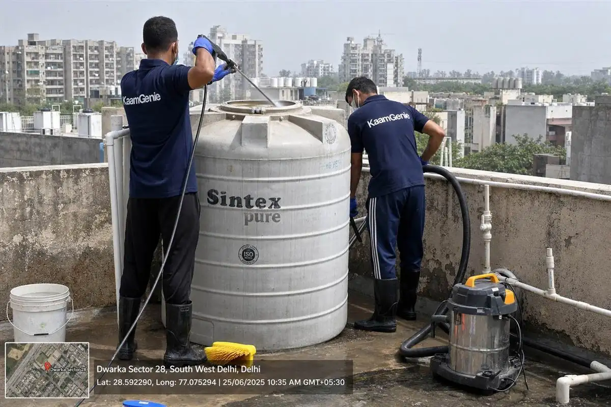 KaamGenie crew cleaning a water tank in Dwarka Sector 28, Delhi