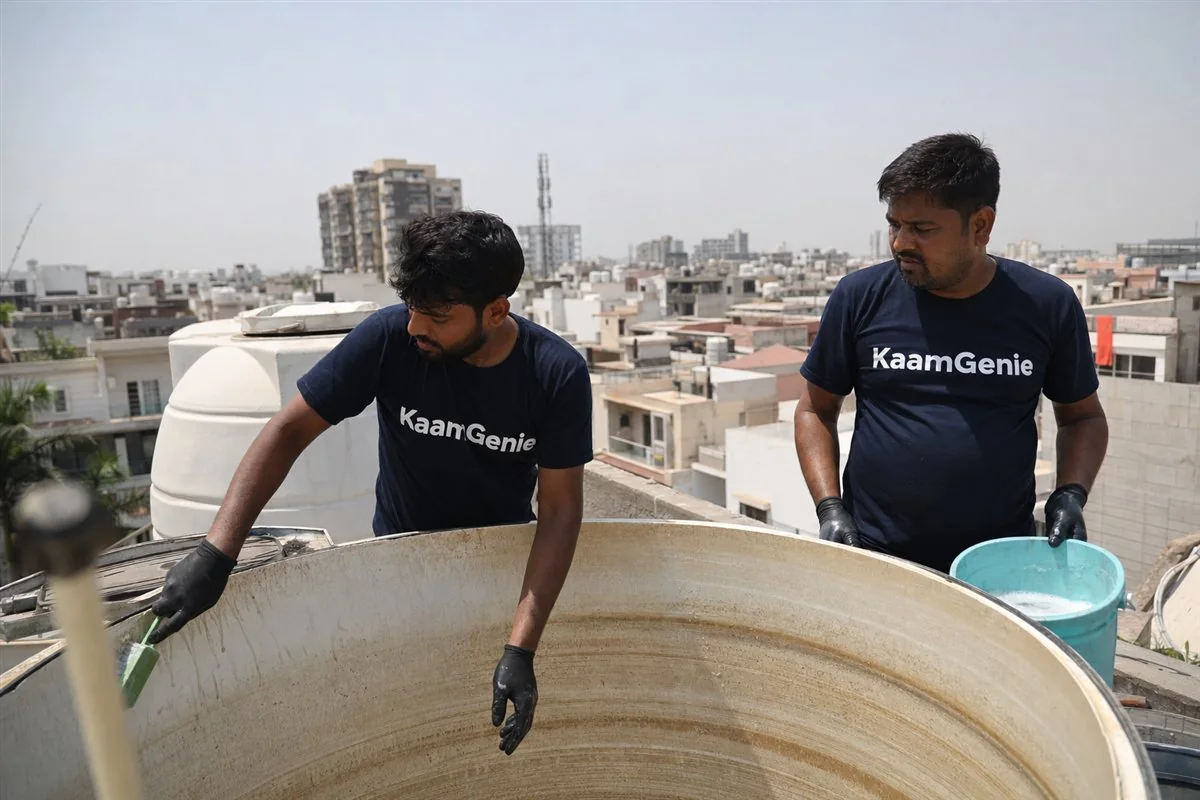 KaamGenie crew cleaning a water tank in Sector 16, Faridabad