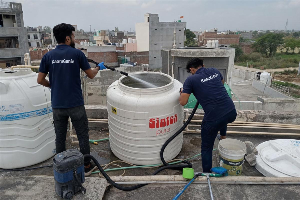 KaamGenie crew cleaning a water tank in Shiv Durga Vihar, Faridabad
