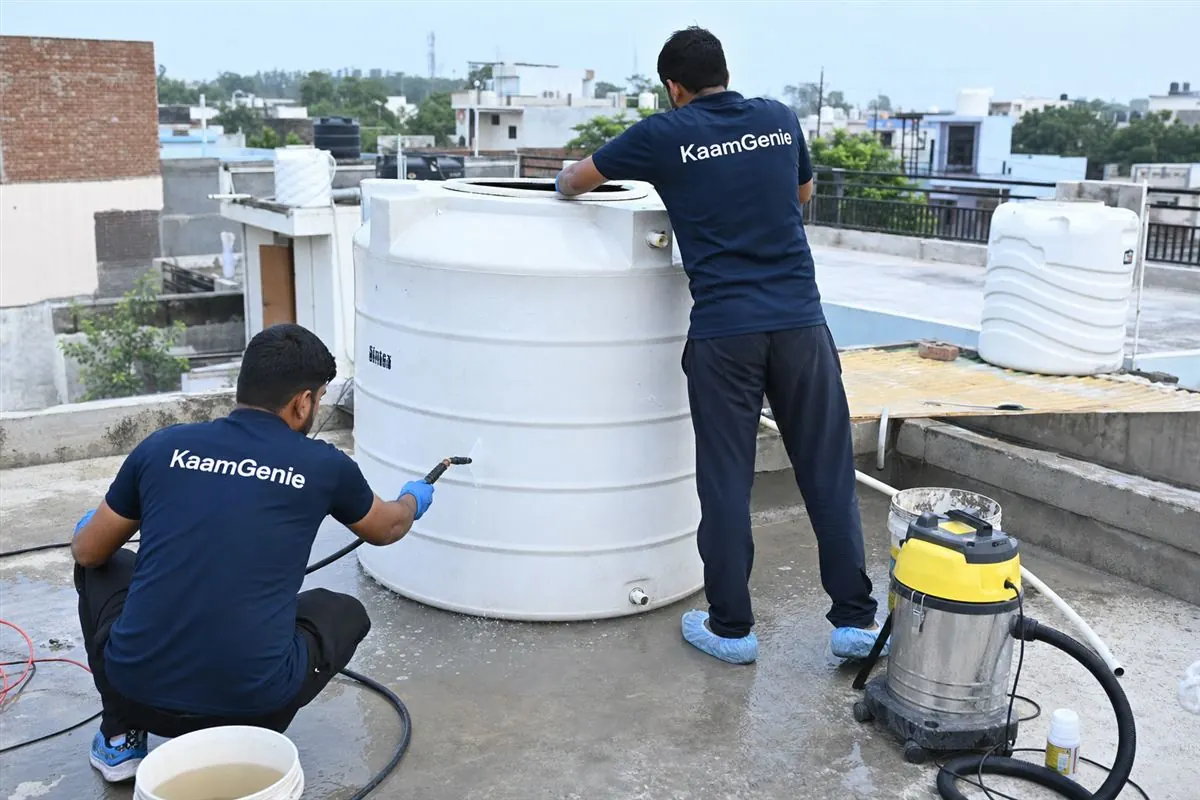 KaamGenie crew cleaning a water tank in Sikri, Faridabad