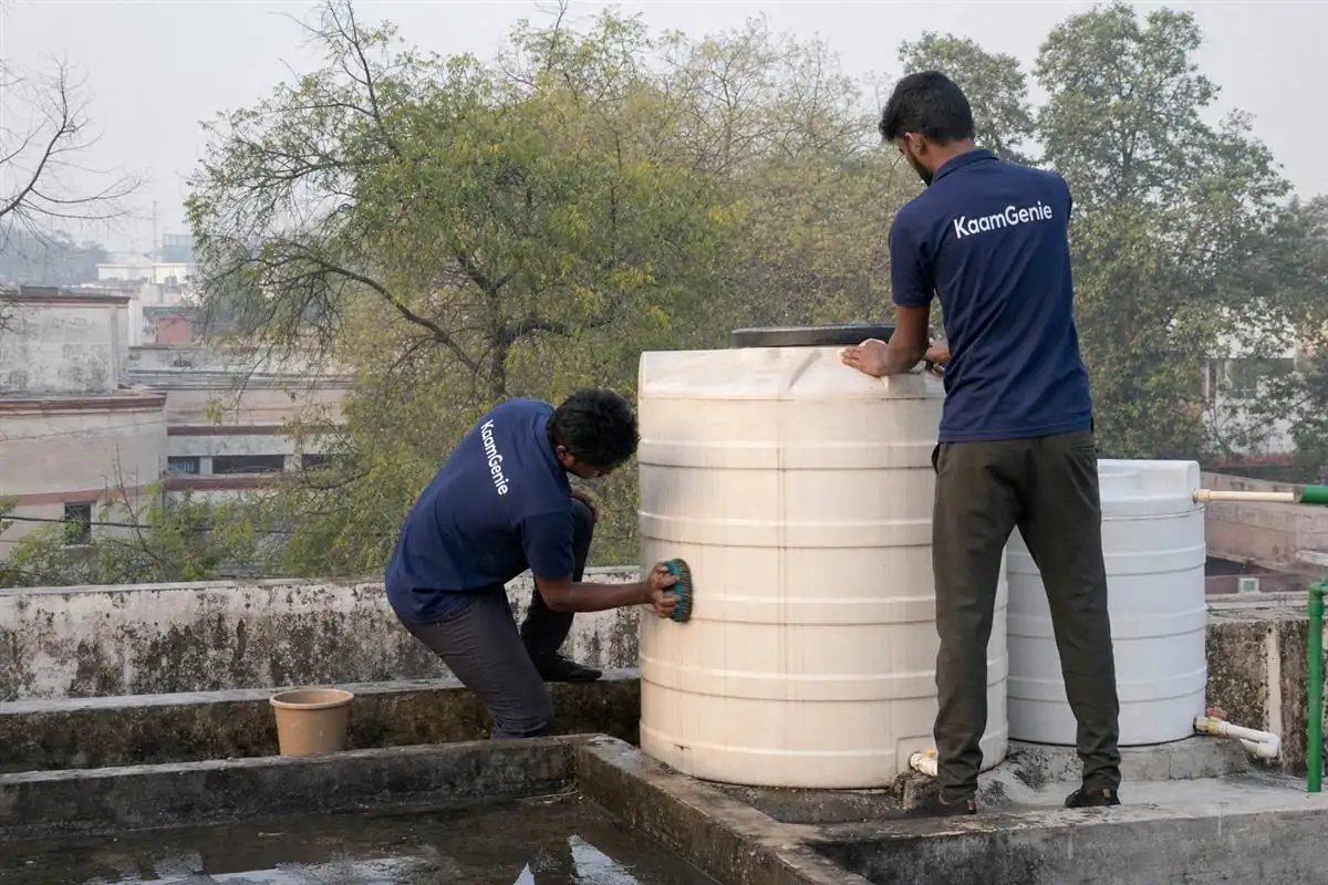 KaamGenie crew cleaning a water tank in Civil Lines, Gurgaon