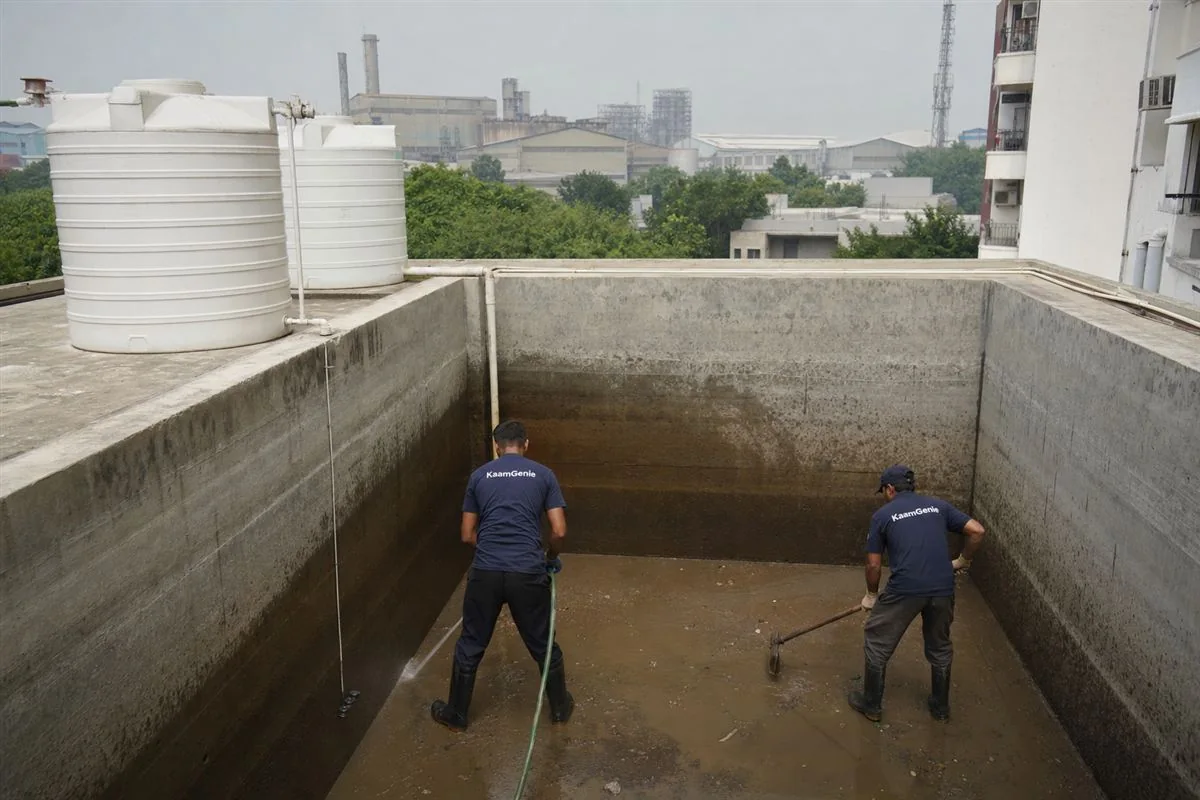 KaamGenie crew cleaning a water tank in IMT Manesar, Gurgaon