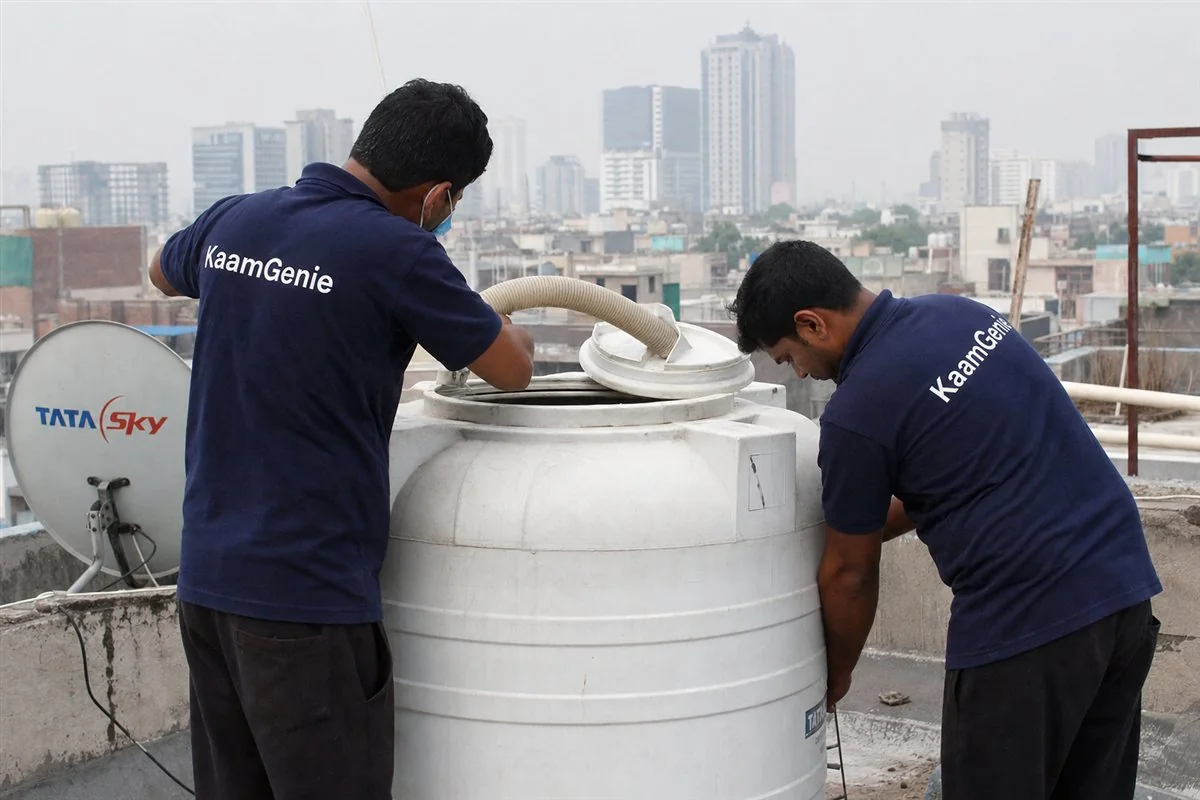 KaamGenie crew cleaning a water tank in Sector 24, Gurgaon
