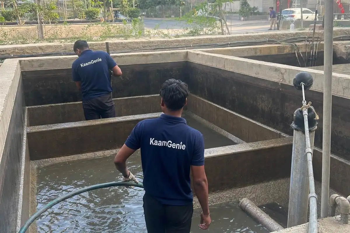 KaamGenie crew cleaning a water tank in Sector 47, Gurgaon