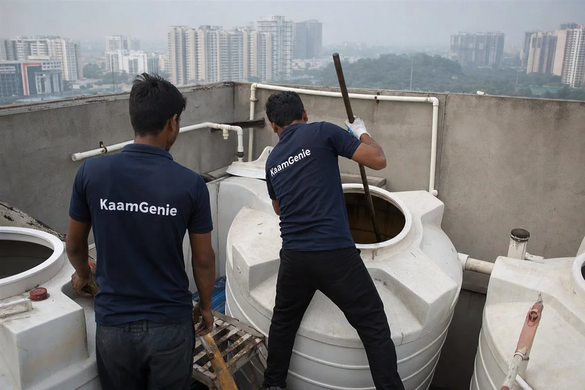 KaamGenie crew cleaning a water tank in Sector 75, Gurgaon