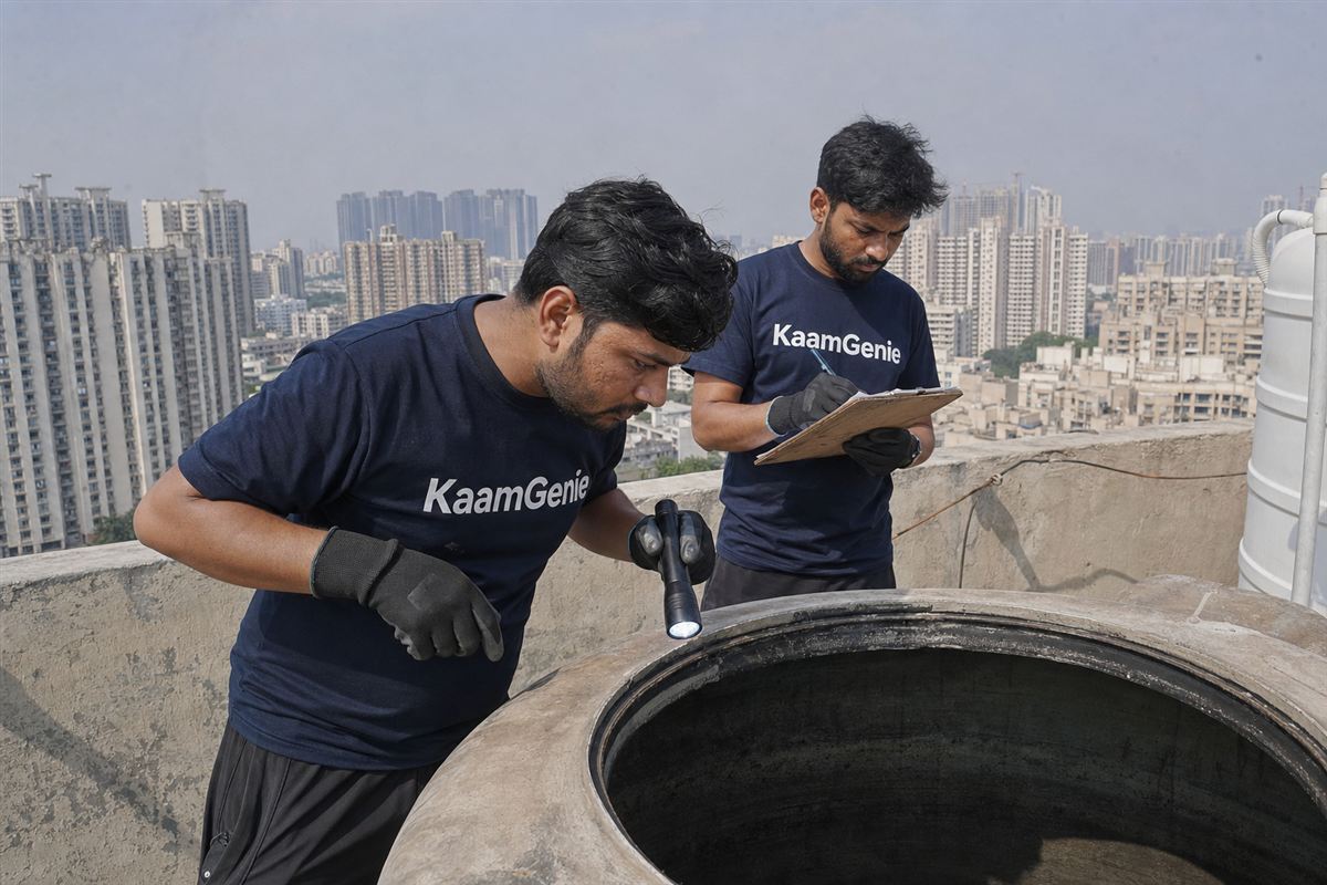 KaamGenie crew cleaning a water tank in Sohna Road, Gurgaon