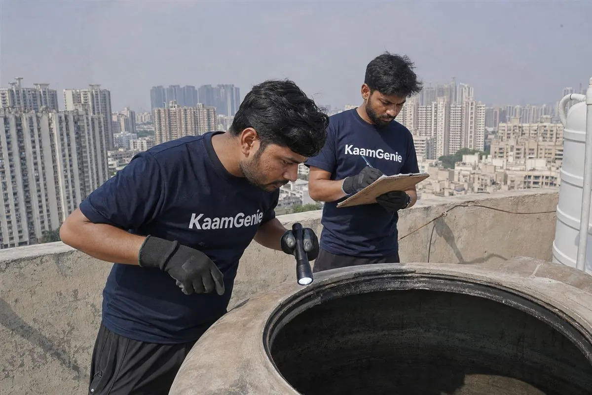 KaamGenie crew cleaning a water tank in Sohna Road, Gurgaon