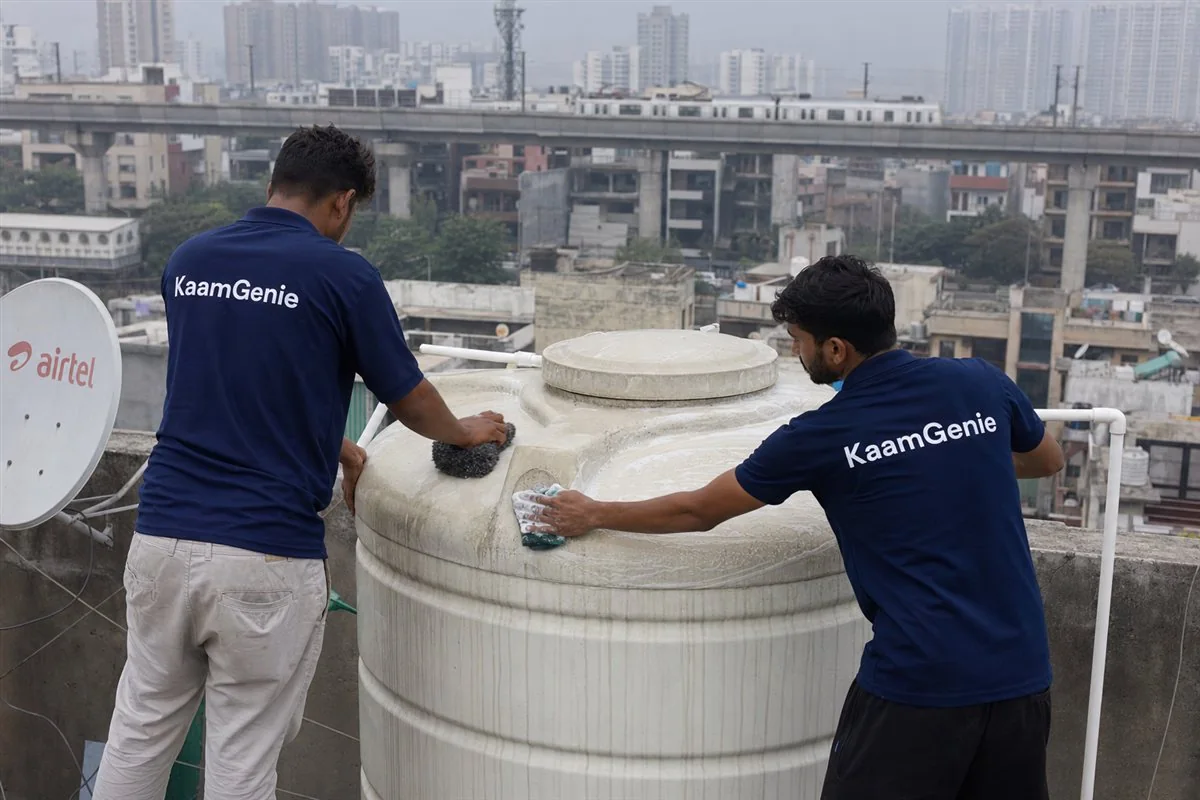 KaamGenie crew cleaning a water tank in Sukhrali, Gurgaon