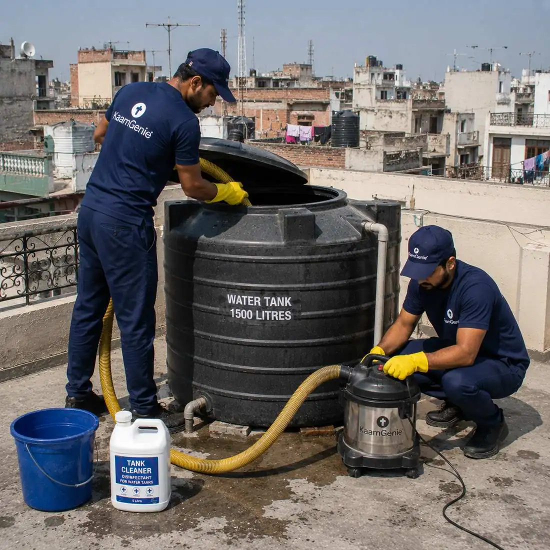 KaamGenie crew cleaning a water tank in Johripur, East Delhi