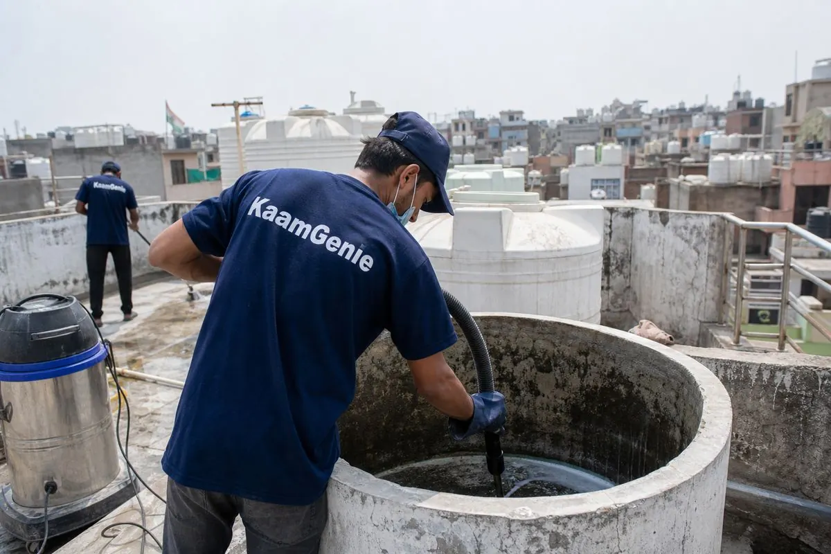 KaamGenie crew cleaning a water tank in Kardampuri, East Delhi