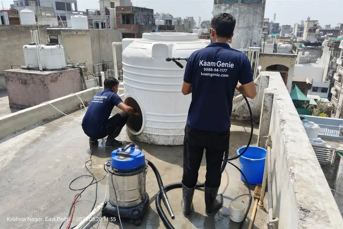 KaamGenie crew cleaning a water tank in Krishna Nagar, Delhi