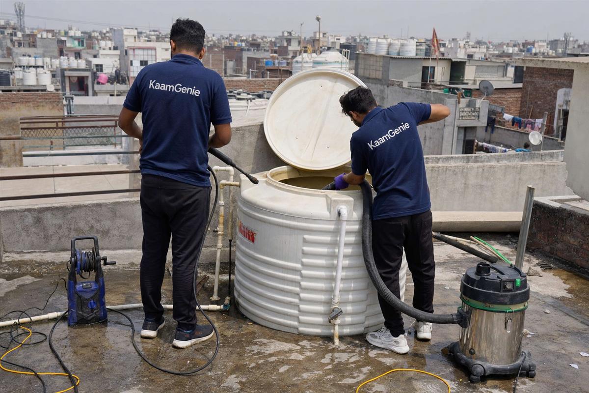 KaamGenie crew cleaning a water tank in Matiala, Delhi