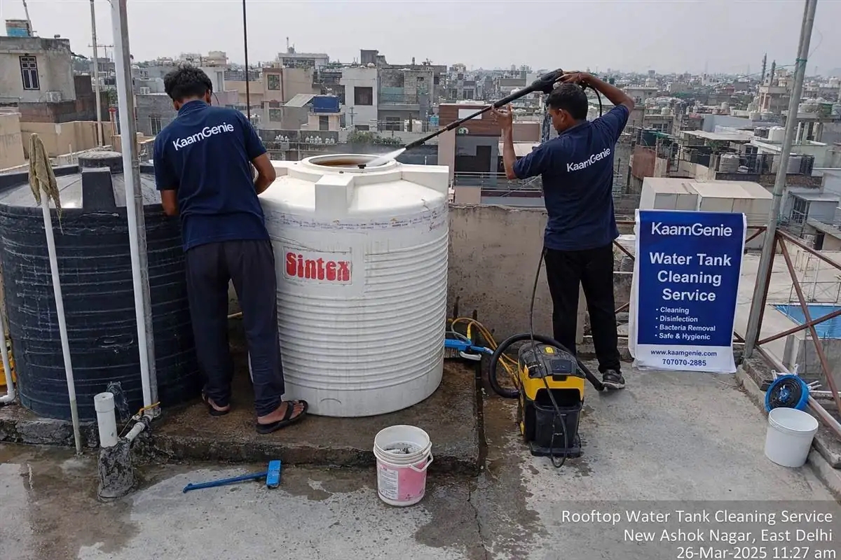 KaamGenie crew cleaning a water tank in New Ashok Nagar, Delhi