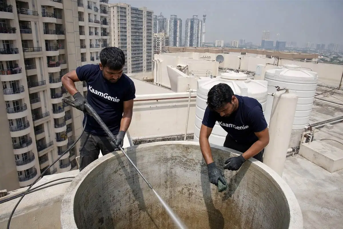 KaamGenie crew cleaning a water tank in Greater Noida West Sector 12, Noida