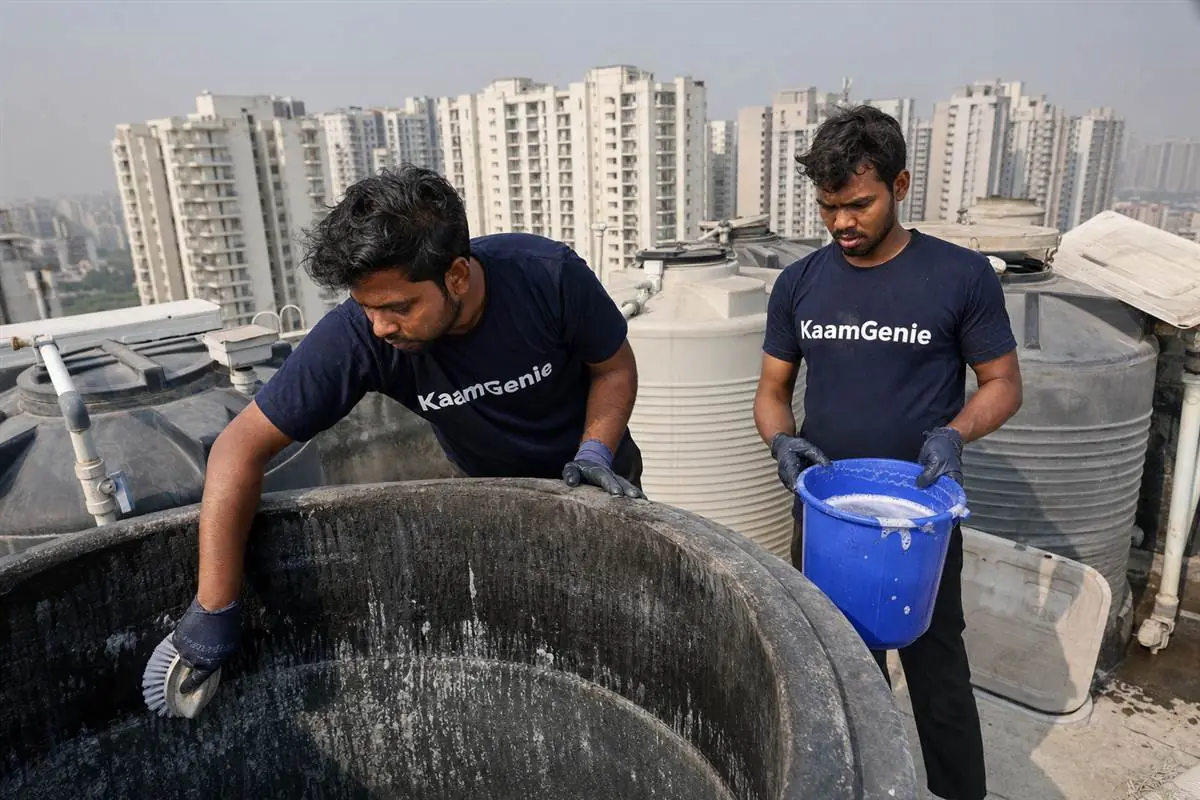 KaamGenie crew cleaning a water tank in Greater Noida West Sector 16, Noida