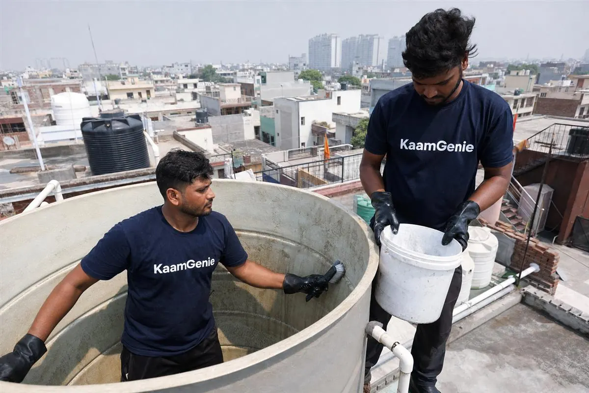 KaamGenie crew cleaning a water tank in Sadarpur, Noida