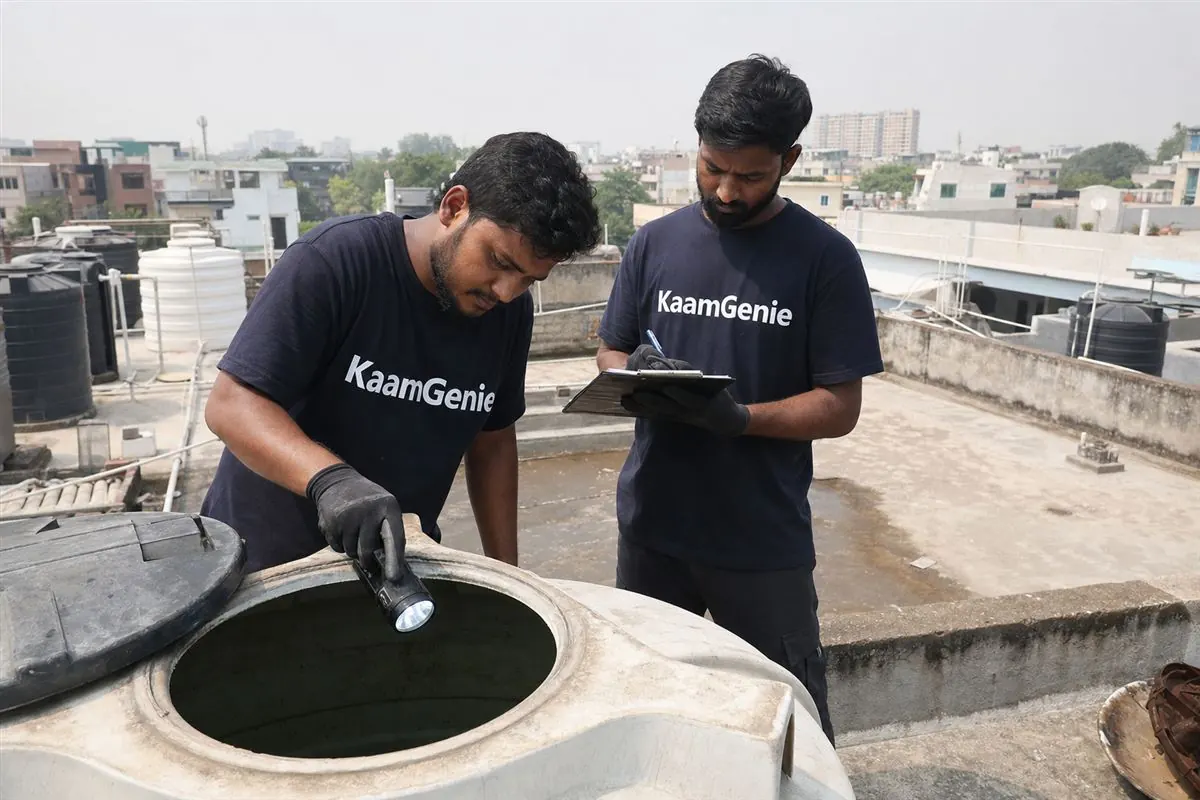 KaamGenie crew cleaning a water tank in Sector 36, Noida