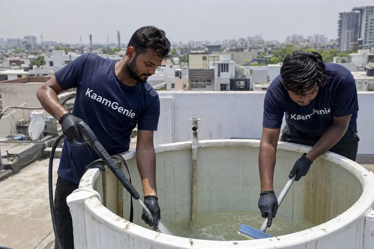 KaamGenie crew cleaning a water tank in Sector 40, Noida