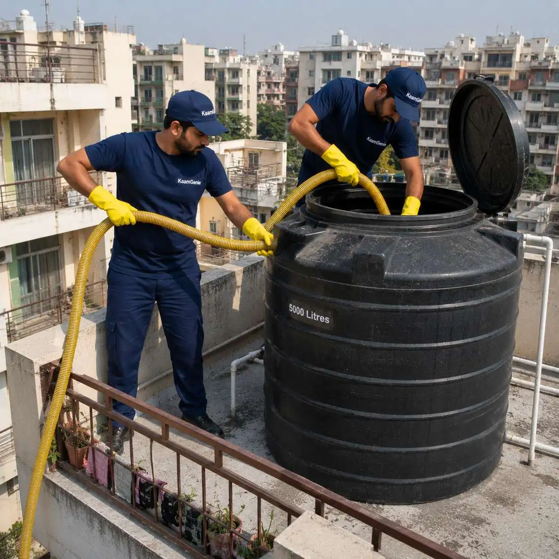 KaamGenie crew cleaning a water tank in Paschim Vihar, West Delhi