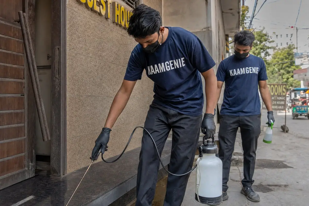 KaamGenie pest control technician treating a Ashram property in South Delhi