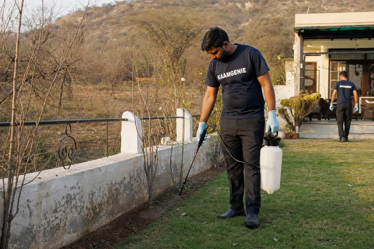 KaamGenie pest control technician treating a Asola property in South Delhi