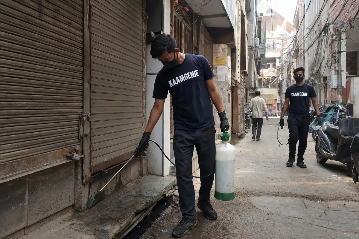 KaamGenie pest control technician treating a Babarpur property in East Delhi