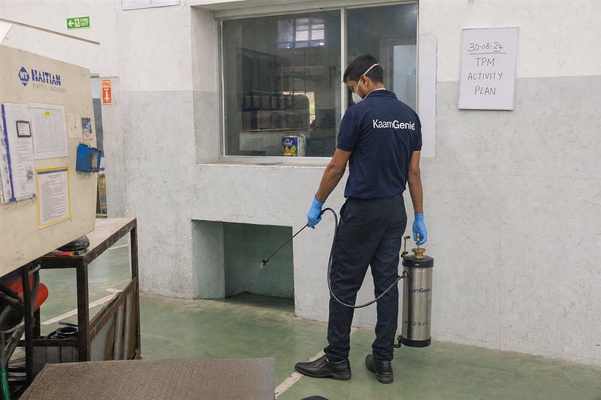 KaamGenie pest control technician treating a Badli property in North-West Delhi