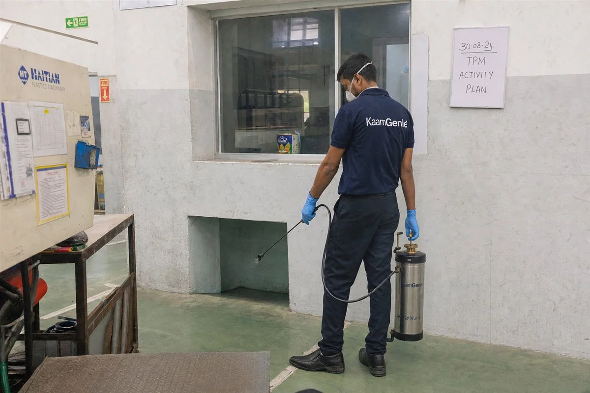 KaamGenie pest control technician treating a Badli property in North-West Delhi