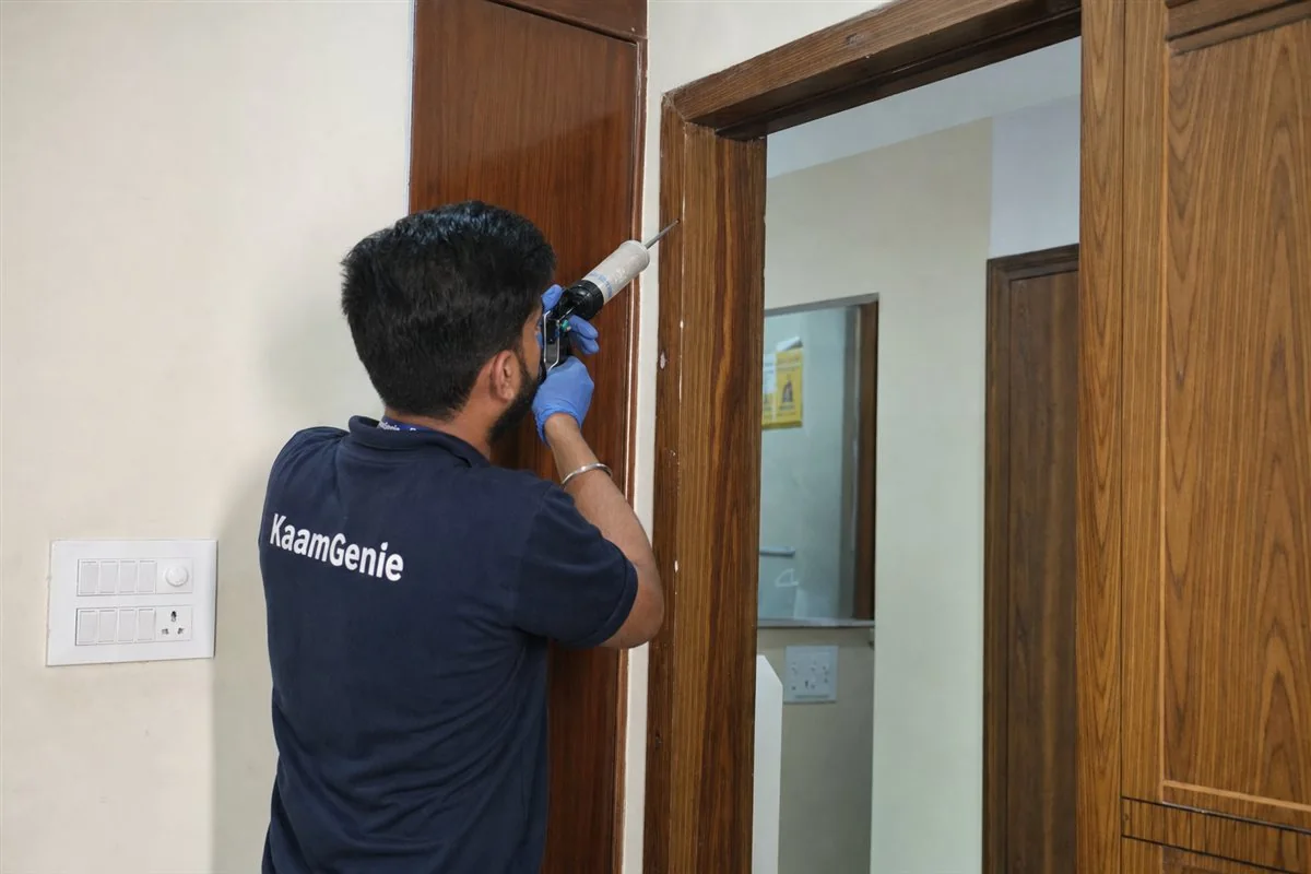 KaamGenie pest control technician treating a Bhajanpura property in East Delhi