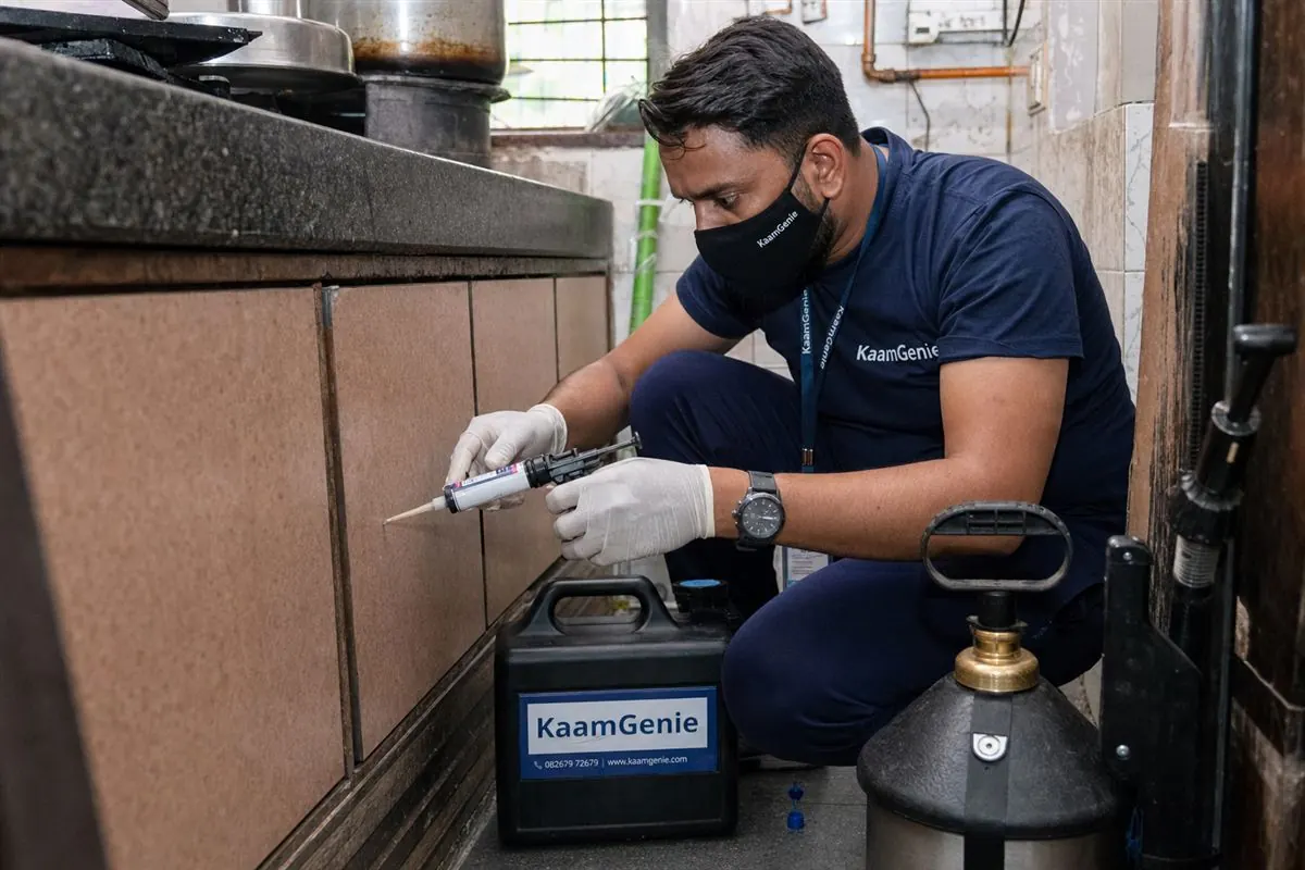 KaamGenie pest control technician treating a Chaukhandi property in West Delhi
