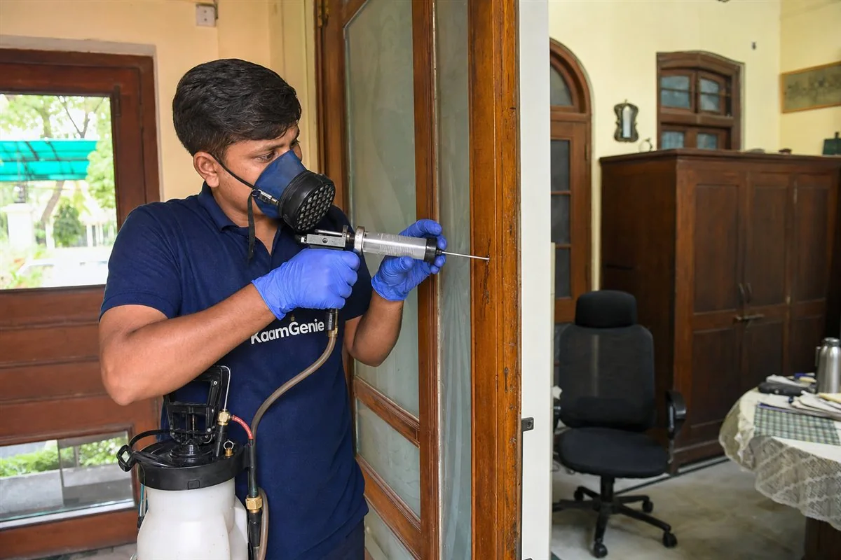 KaamGenie pest control technician treating a Civil Lines property in North Delhi / Central Delhi