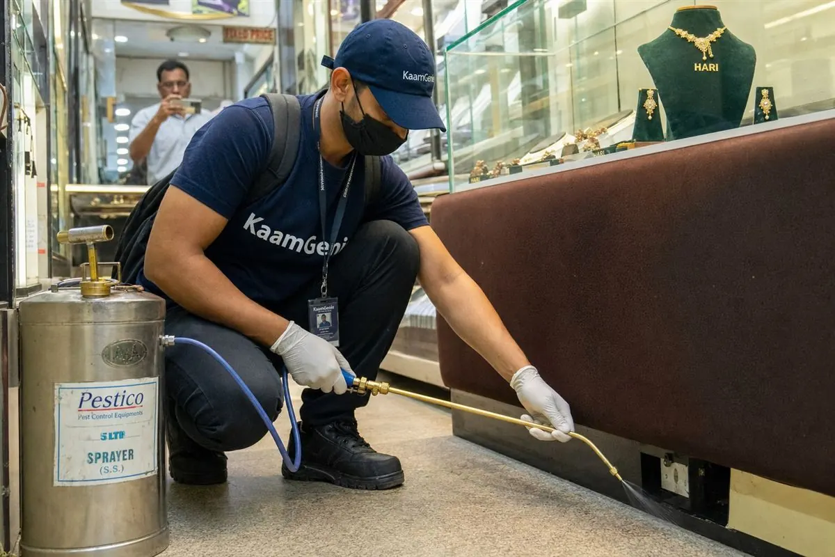 KaamGenie pest control technician treating a Dariba Kalan property in North Delhi / Central Delhi