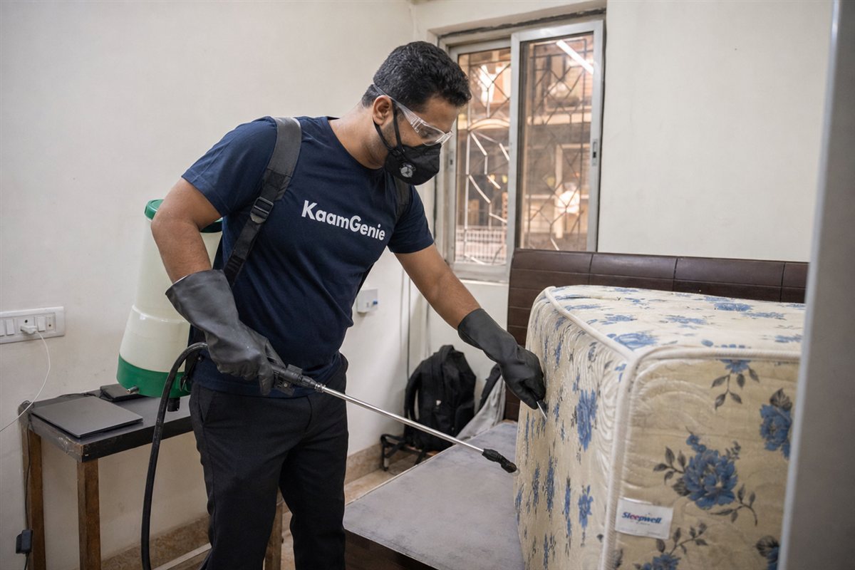 KaamGenie pest control technician treating a Daryaganj property in North & Central Delhi