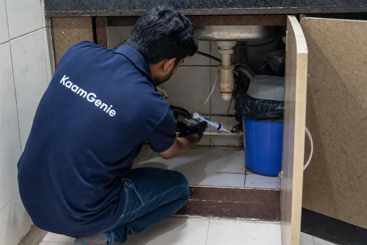 KaamGenie pest control technician treating a Dwarka Sector 13 property in West Delhi