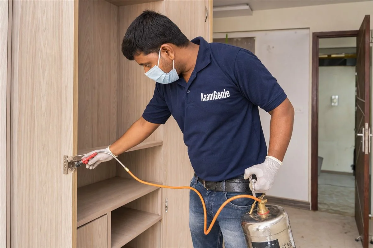 KaamGenie pest control technician treating a Dwarka Sector 14 property in West Delhi