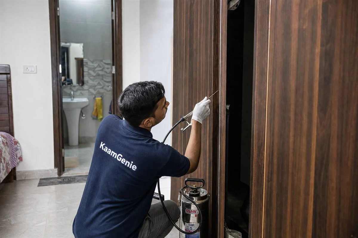 KaamGenie pest control technician treating a Dwarka Sector 2 property in West Delhi