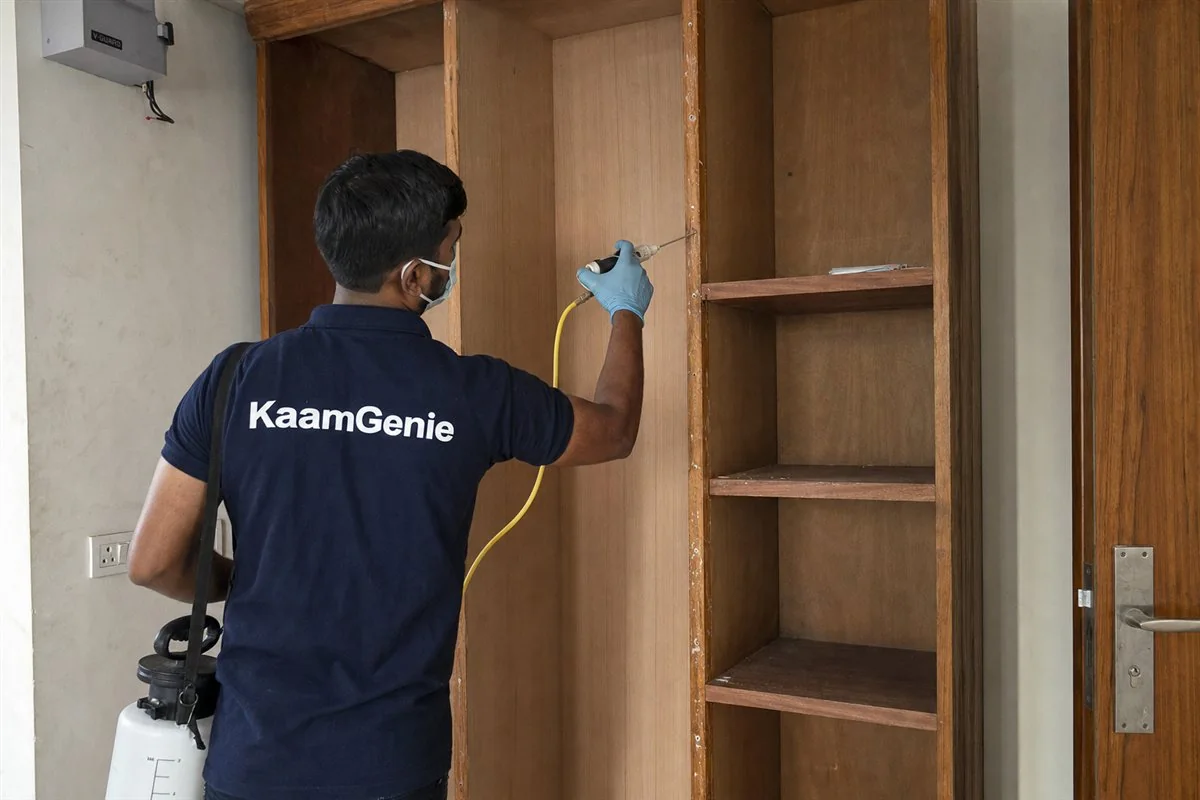 KaamGenie pest control technician treating a Dwarka Sector 20 property in West Delhi