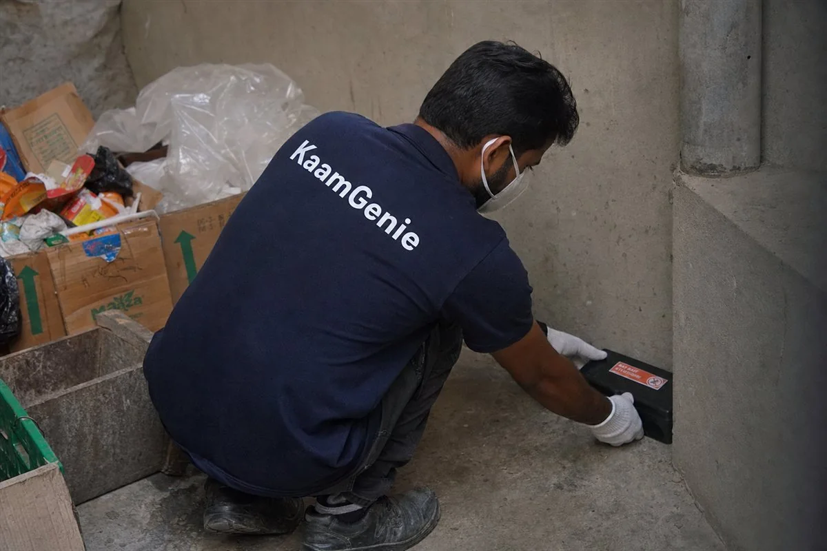 KaamGenie pest control technician treating a Dwarka Sector 21 property in West Delhi