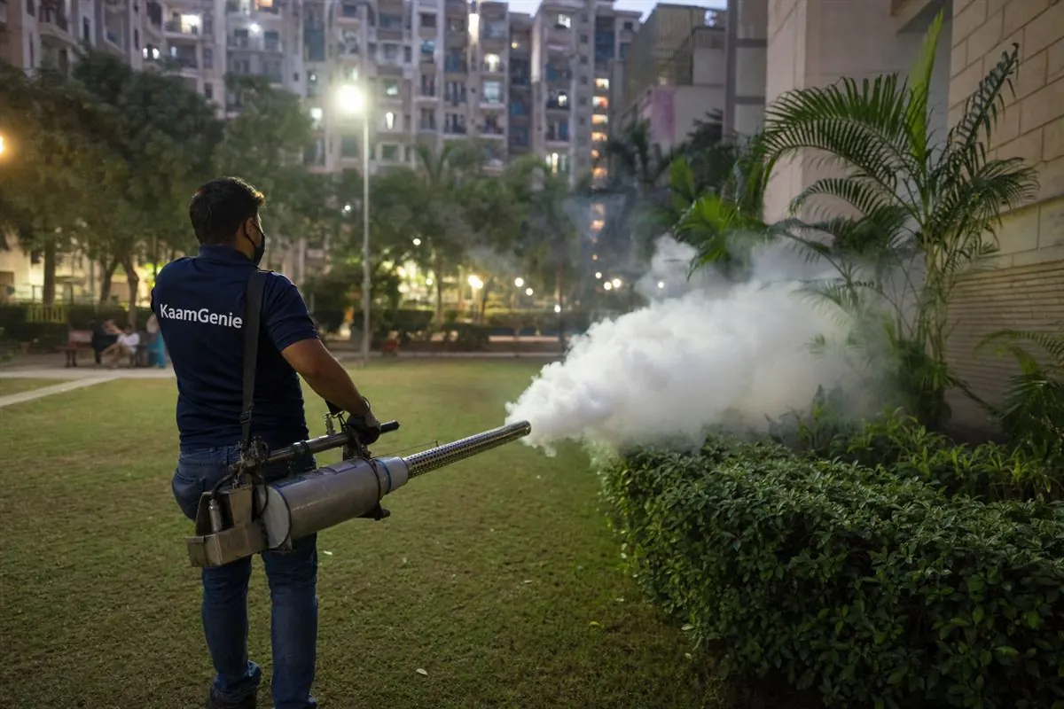 KaamGenie pest control technician treating a Dwarka Sector 22 property in West Delhi