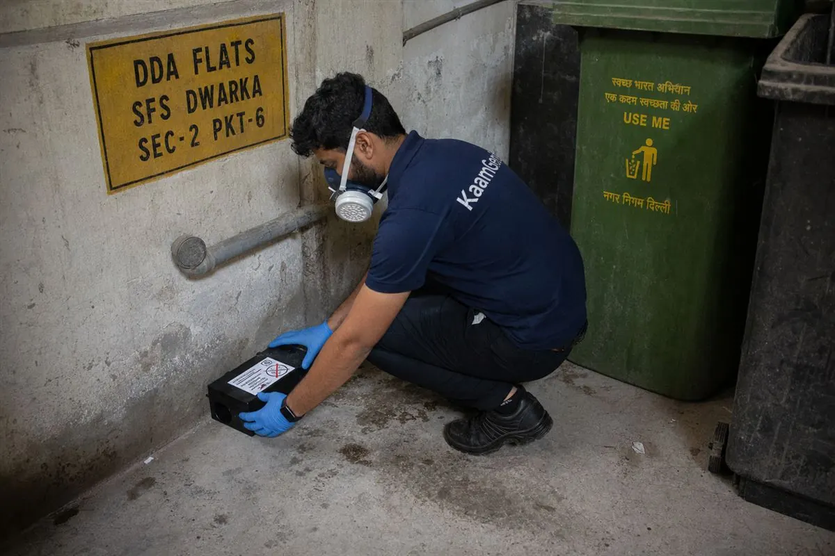 KaamGenie pest control technician treating a Dwarka Sector 27 property in West Delhi
