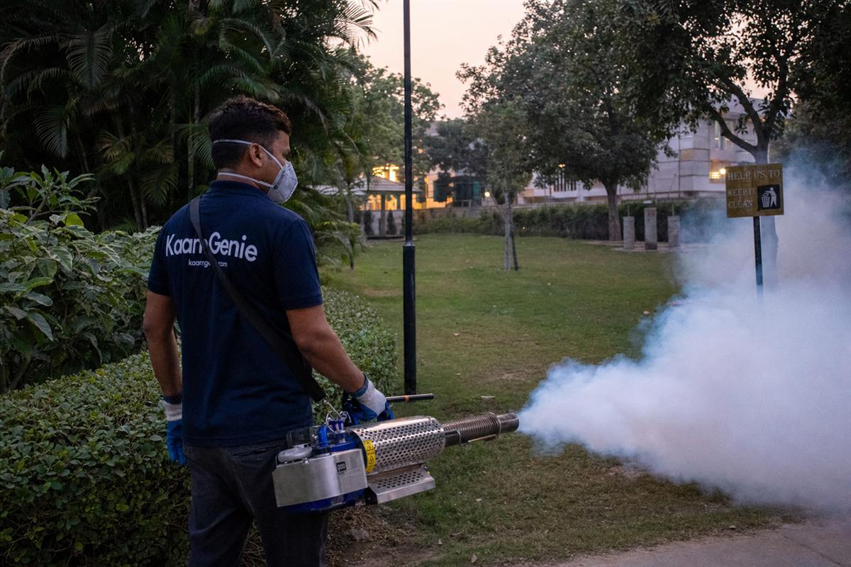 KaamGenie pest control technician treating a Dwarka Sector 4 property in West Delhi