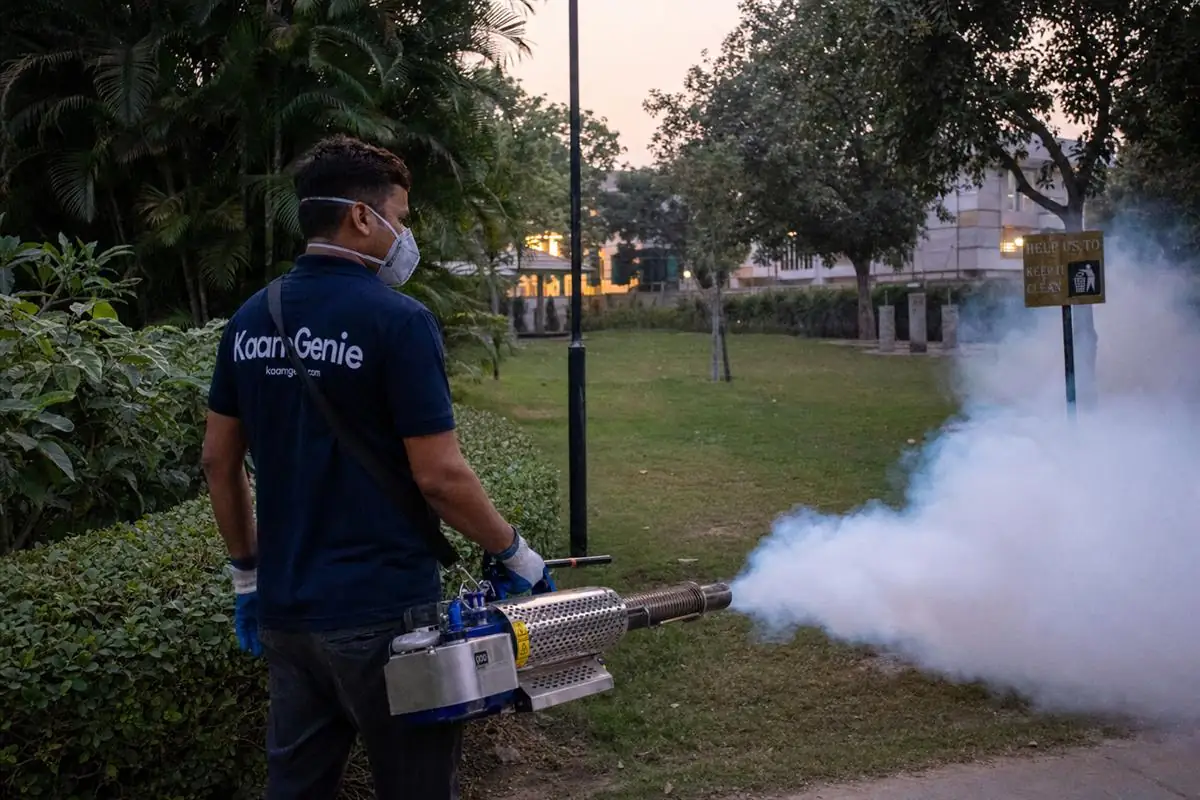 KaamGenie pest control technician treating a Dwarka Sector 4 property in West Delhi