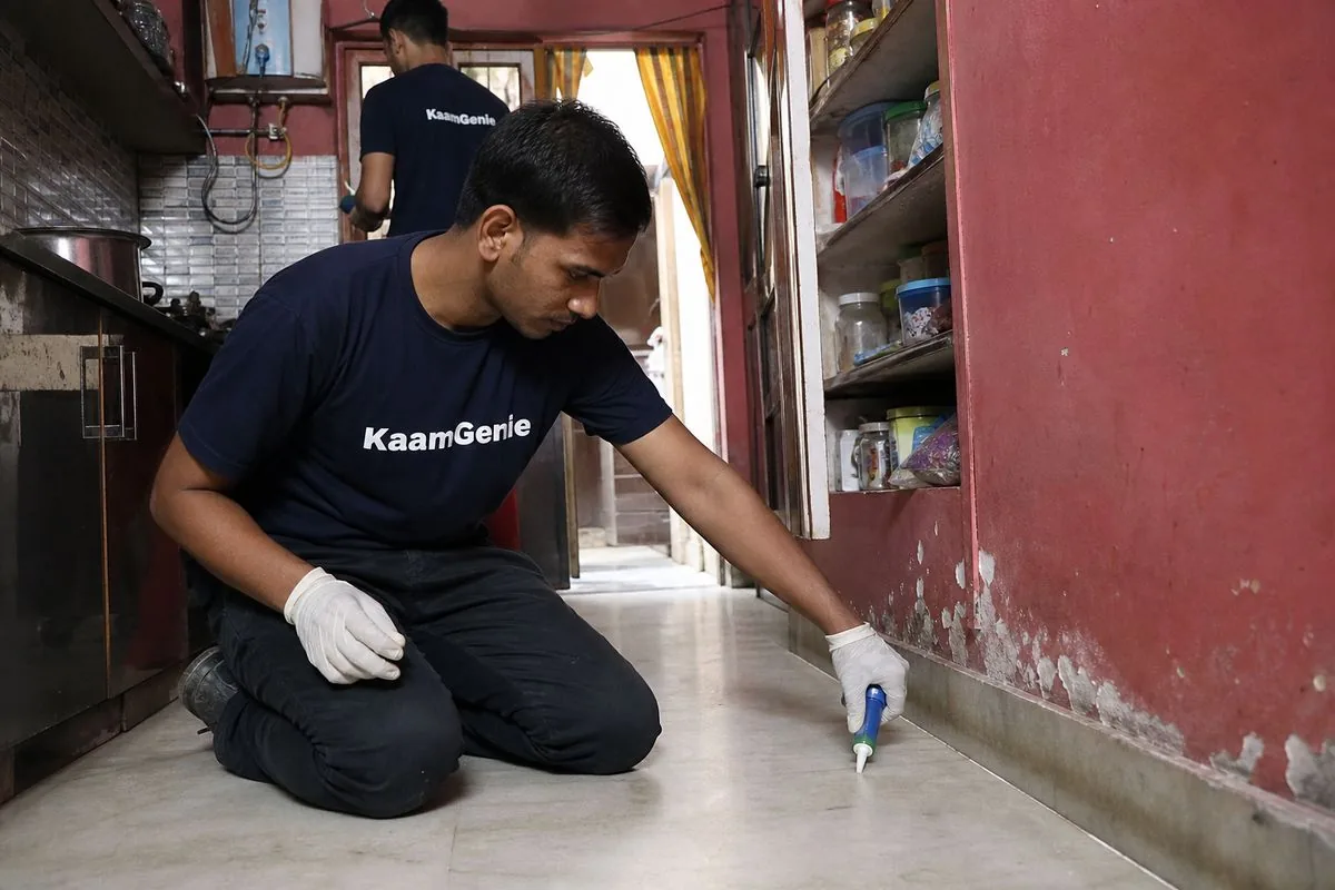 KaamGenie pest control technician treating a Amar Nagar property in Faridabad
