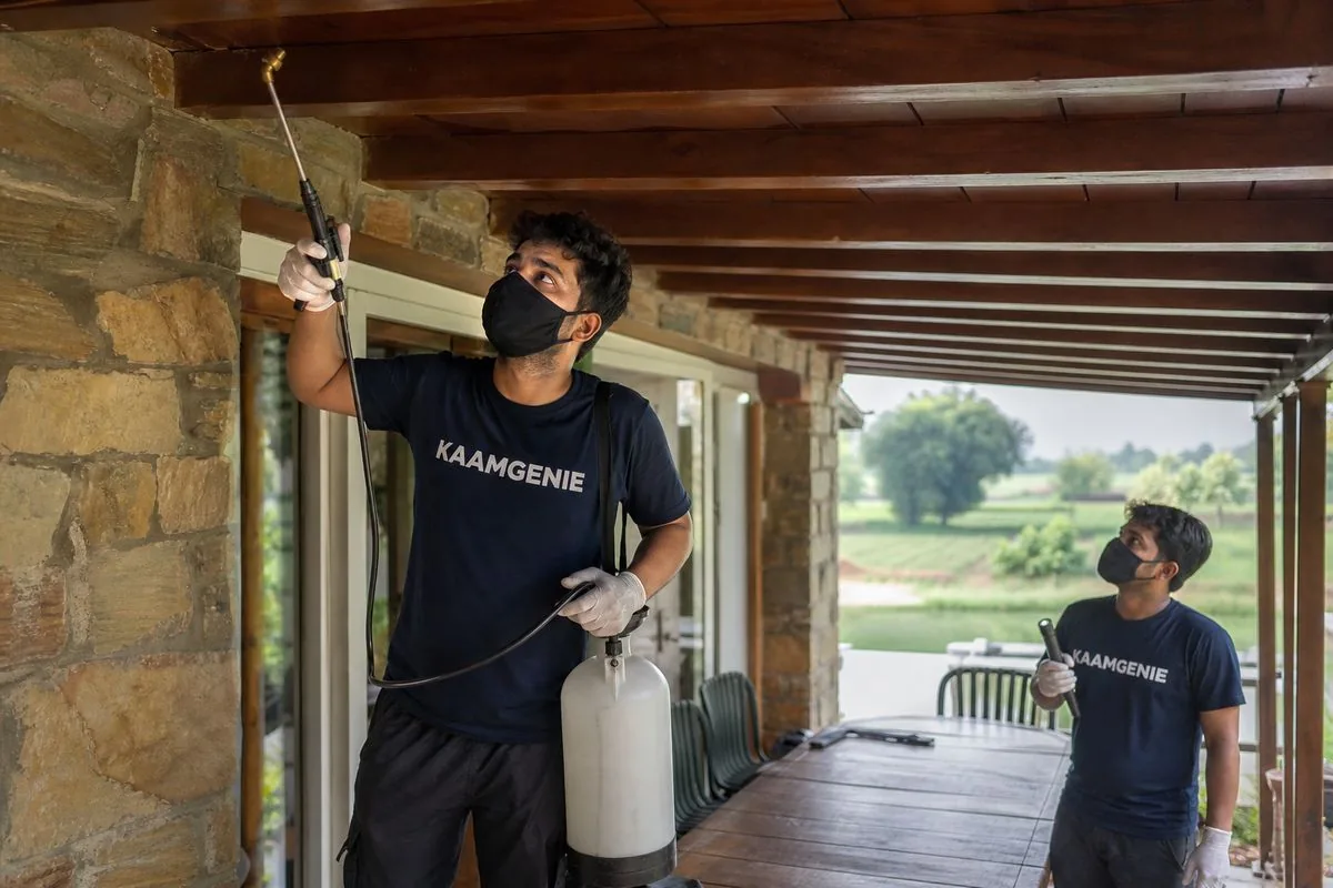 KaamGenie pest control technician treating a Mohna property in Faridabad
