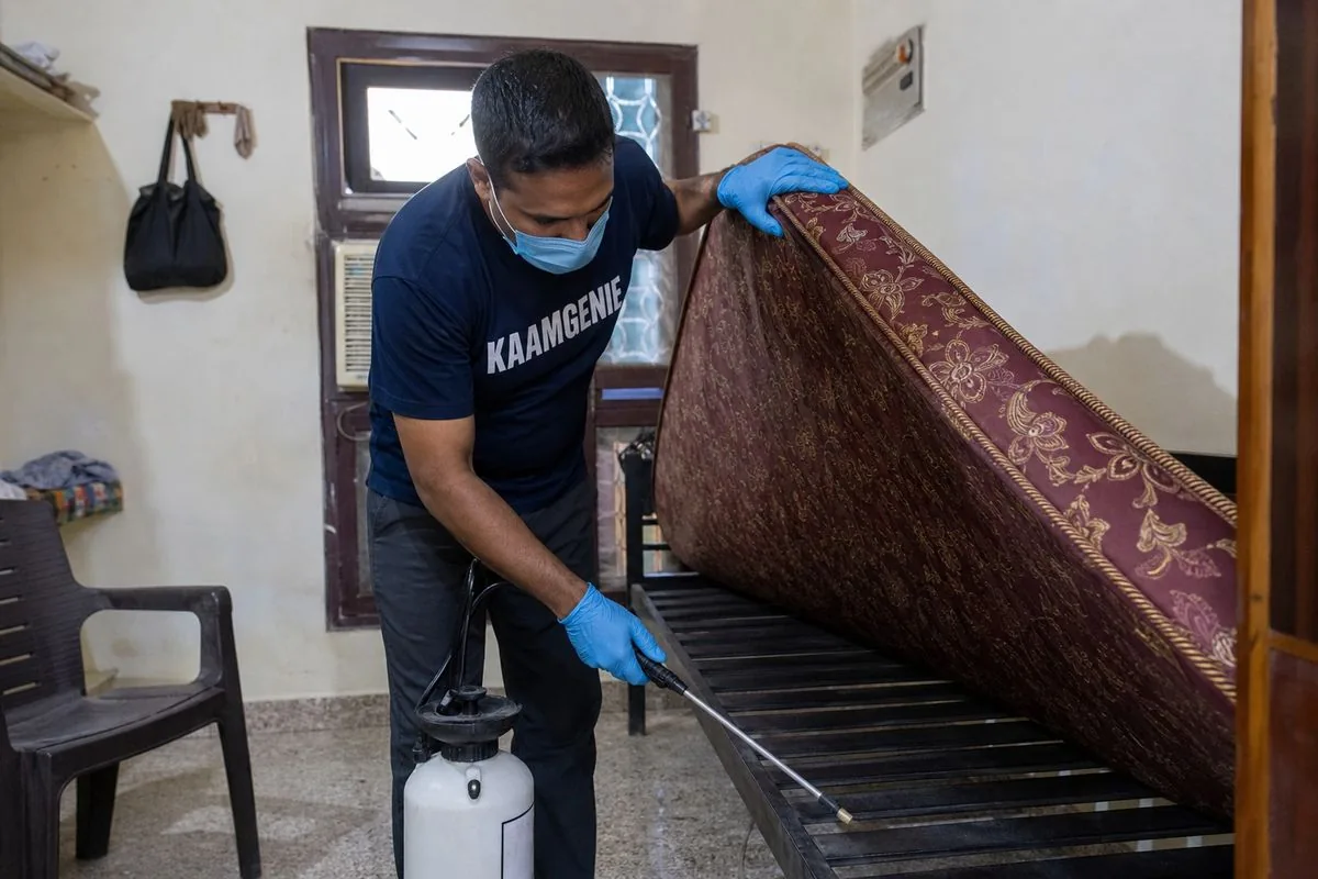 KaamGenie pest control technician treating a Sanjay Colony property in Faridabad