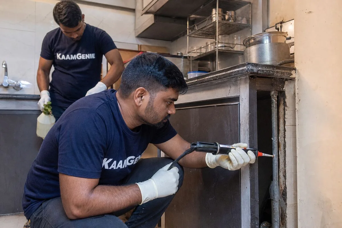KaamGenie pest control technician treating a Sector 19 property in Faridabad